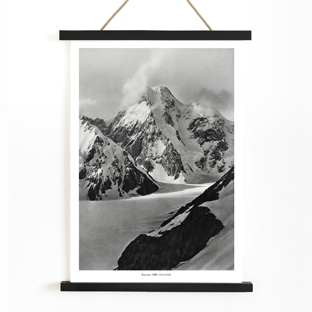 Snow covered mountain landscape by Vittorio Sella Staircase vue prise au dessus du glacier Godwin Austen poster artwork, with wooden magnetic frame on white background