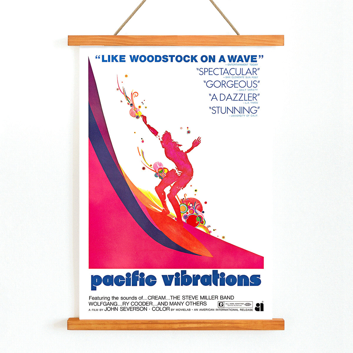 Pacific Vibrations surfing documentary poster by John Severson featuring colorful surfer illustrations and a surfer riding a wave, with wooden magnetic frame on white background