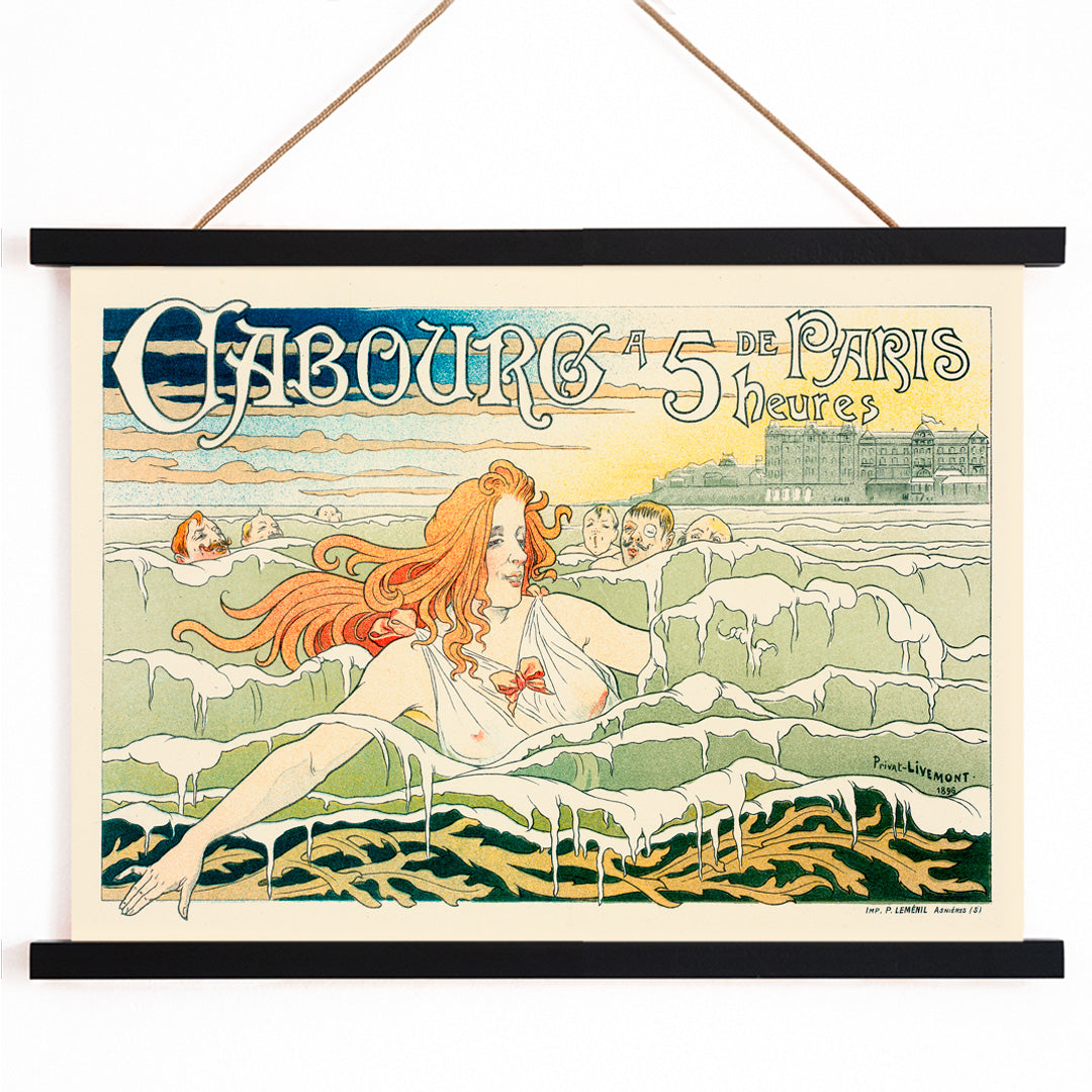 Art Nouveau poster of a red haired woman with flowing hair swimming in the sea near Casino De Cabourg by Henri Privat Livemont, with wooden magnetic frame on white background