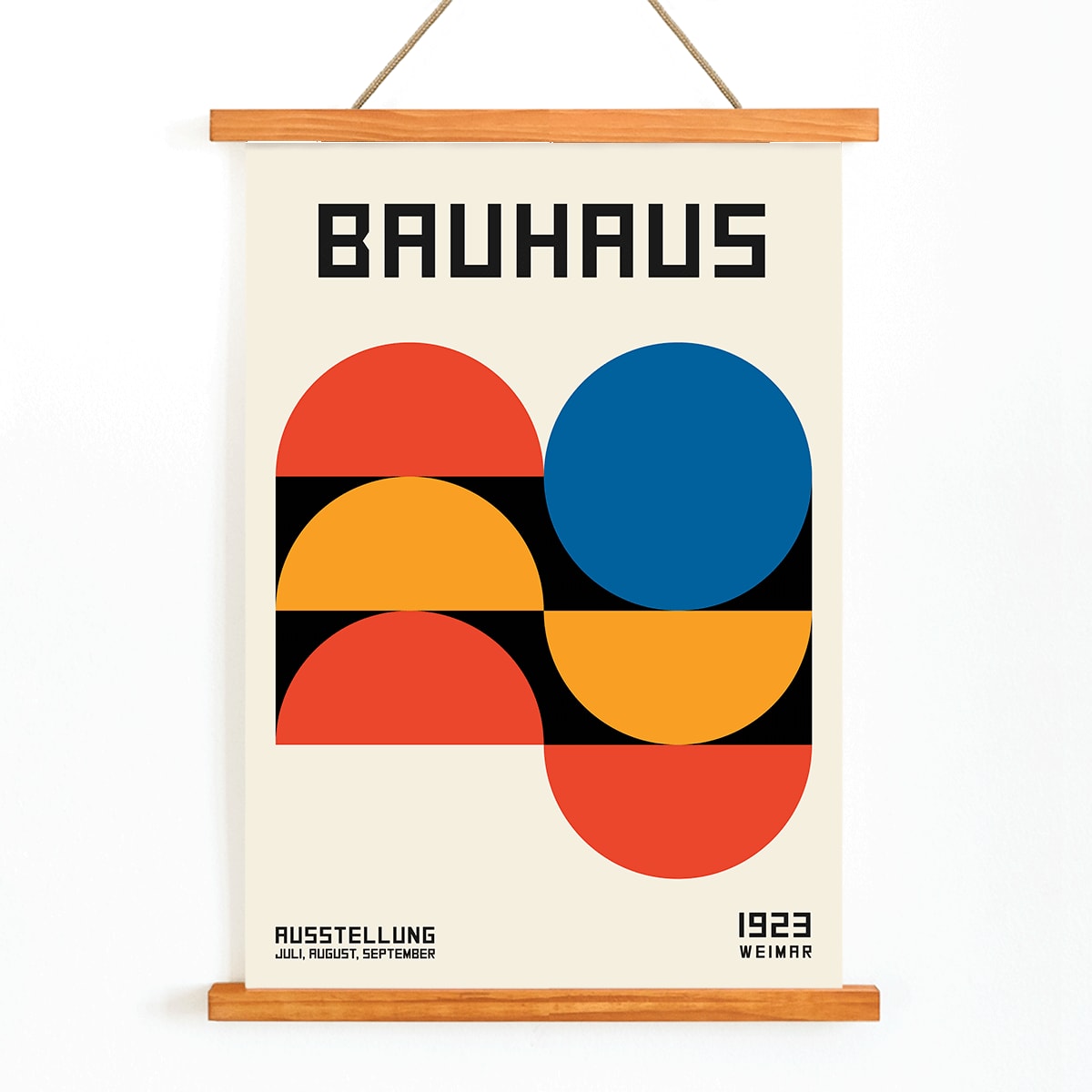 Bauhaus Poster 18 with bold geometric shapes in red blue and yellow on a white background minimalist design primary colors and Bauhaus text at the top, with wooden magnetic frame on white background
