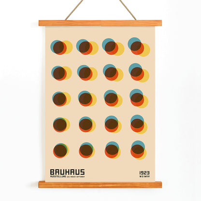 Bauhaus Poster 7 inspired by the 1923 Weimar Exhibition featuring colorful geometric overlapping circles in blue red yellow and brown tones, with wooden magnetic frame on white background