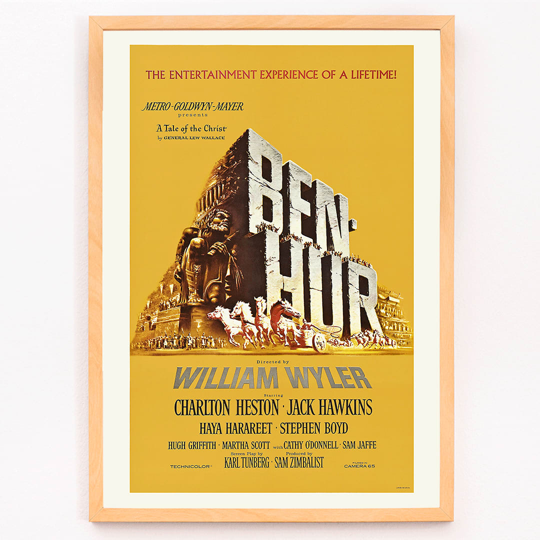 Ben-Hur film poster by William Wyler with Charlton Heston Jack Hawkins large stone chariot race horses and ancient Roman architecture, framed and displayed in modern living room decor