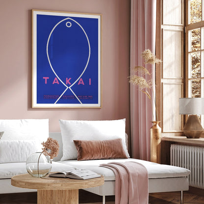 Minimalist blue and white fish outline artwork poster on blue background with Takai exhibition details by Teiji Takai, framed and displayed in home decor