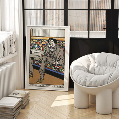 Poster of a man lounging in an ornate Viennese café setting on a floral bench at a table titled Viennese Café The Man of Letters by Moriz Jung, framed and displayed in home decor
