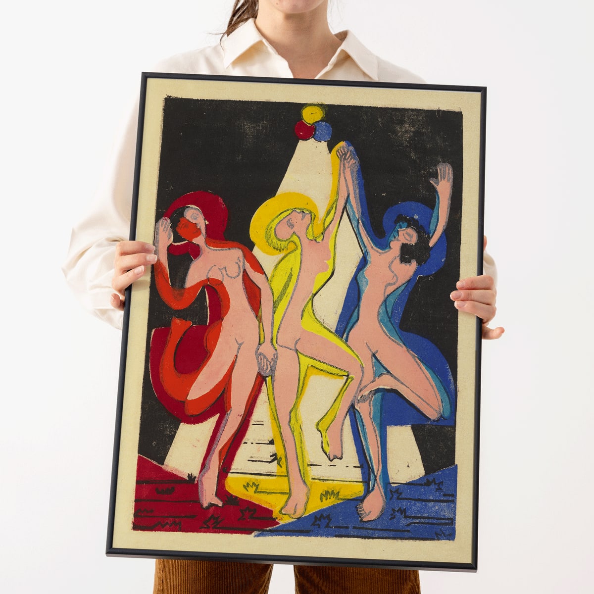 Dance of Colours by Ernst Ludwig Kirchner poster featuring three abstract dancing figures in vibrant hues, framed and displayed in modern living room decor