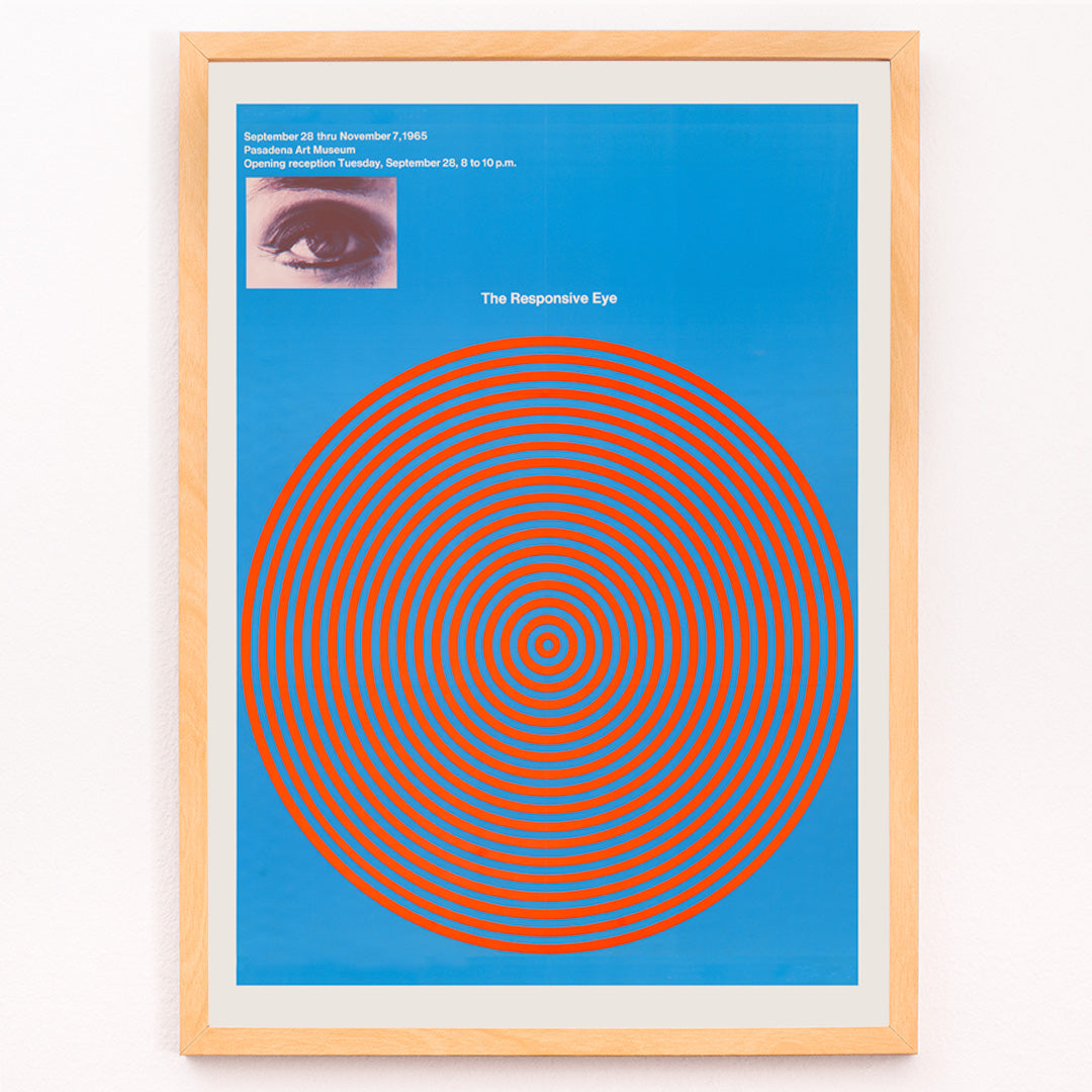 Closeup detail of Op art poster with blue and red concentric circles and eye detail from The Responsive Eye by Patrick Blackwell