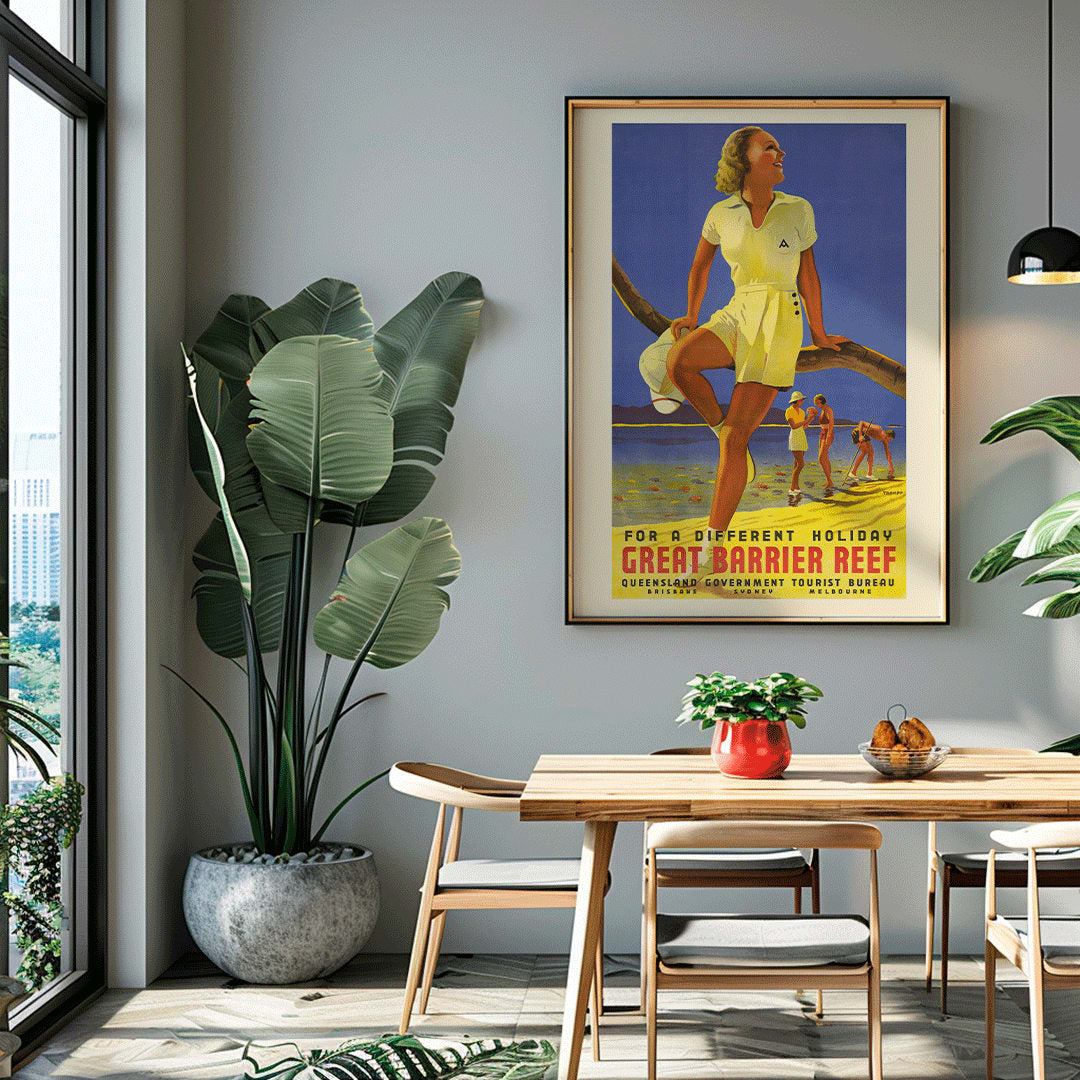 Vintage travel poster by Percival Albert Trompf showing a woman sitting on a branch at the Great Barrier Reef with people enjoying the beach in the background, framed and displayed in home decor