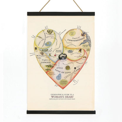 Heart shaped map illustration and poster Geographical Guide to a Womans Heart by Jo Lowery whimsical map of emotions in the shape of a heart, with wooden magnetic frame on white background