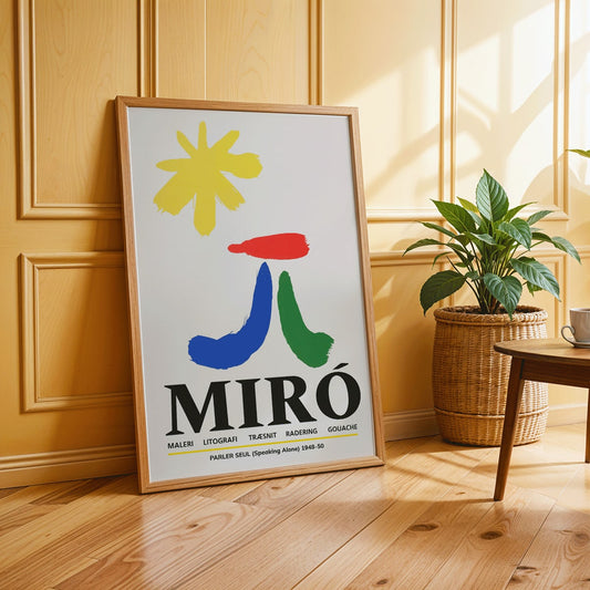 Parler Seul exhibition poster by Joan Miro with abstract colorful shapes on a light background, framed and displayed in home decor