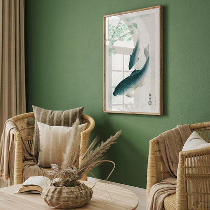 Two koi fish swimming under water plants and near green lily pads artwork by Ohara Koson serene Japanese style, framed and displayed in home decor