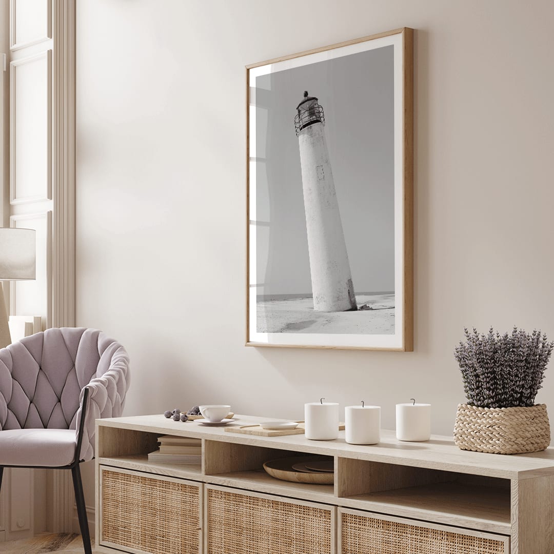 Cape Saint George Lighthouse poster featuring a tilted lighthouse on a sandy beach in Apalachicola Franklin County Florida, framed and displayed in home decor