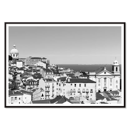 Black and white landscape of Lisbon Old City with historic architecture rooftops and distant sea view poster by Picture 2, with black aluminium frame on white background