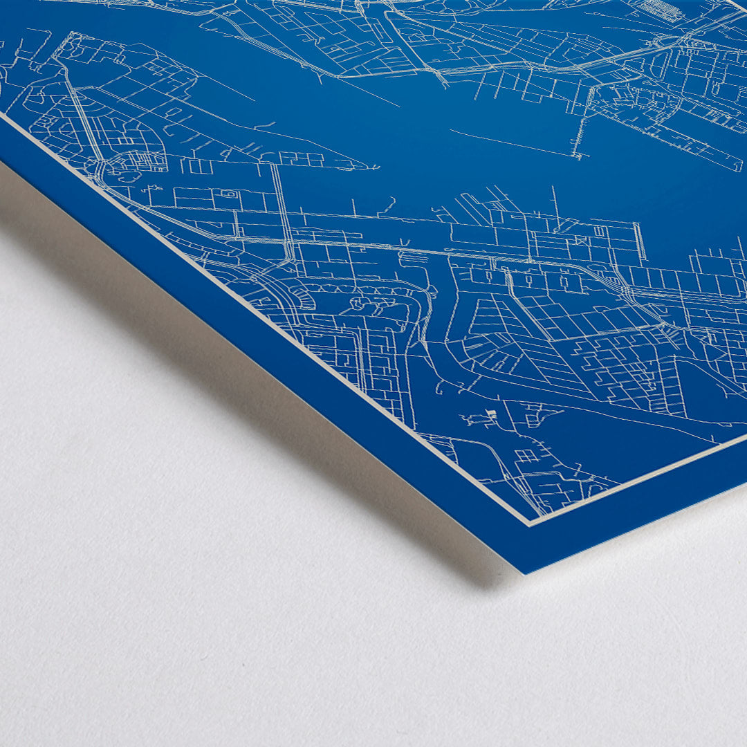 Closeup detail of Amsterdam minimalist map artwork poster in blue and white showing detailed city streets and waterways
