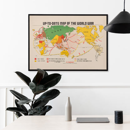 Colorful illustrated world war map showing Axis and Allied powers and marked war zones by Manila Shinbun-sha up-to-date map of the world war, framed and displayed in home decor