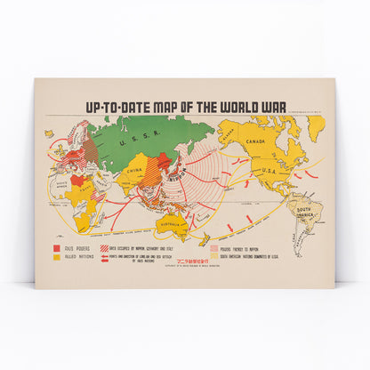 Colorful illustrated world war map showing Axis and Allied powers and marked war zones by Manila Shinbun-sha up-to-date map of the world war, framed and displayed in modern living room decor