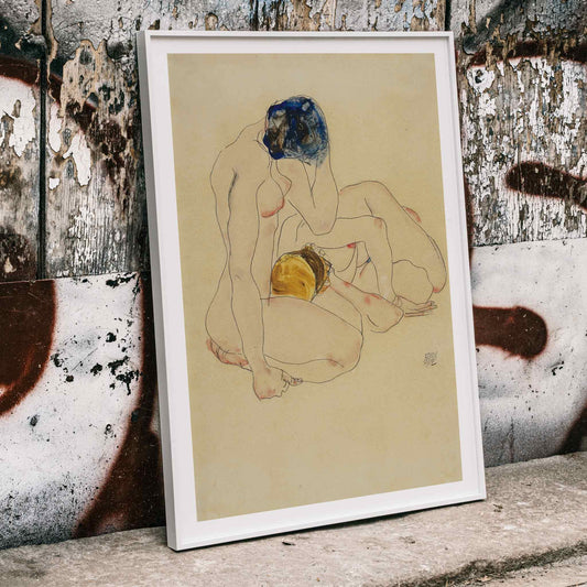 Two Friends by Egon Schiele poster featuring two nude figures in an intimate seated pose with expressive linework artwork, framed and displayed in home decor