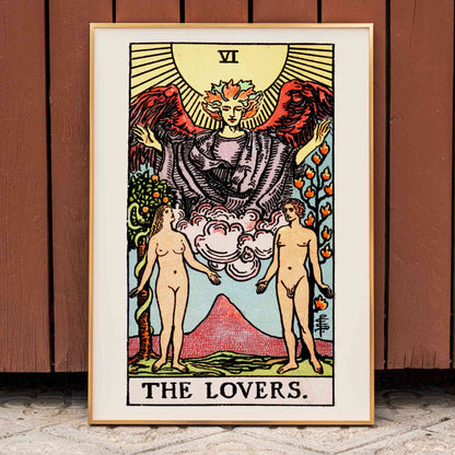 The Lovers Tarot card by Rider Waite featuring a winged angel above a man and woman in a garden illustration and poster, framed and displayed in home decor