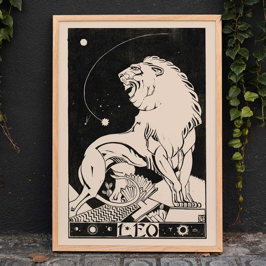 Art deco poster of a stylized roaring lion representing Leo zodiac sign by Henri van der Stok in black and white, framed and displayed in home decor