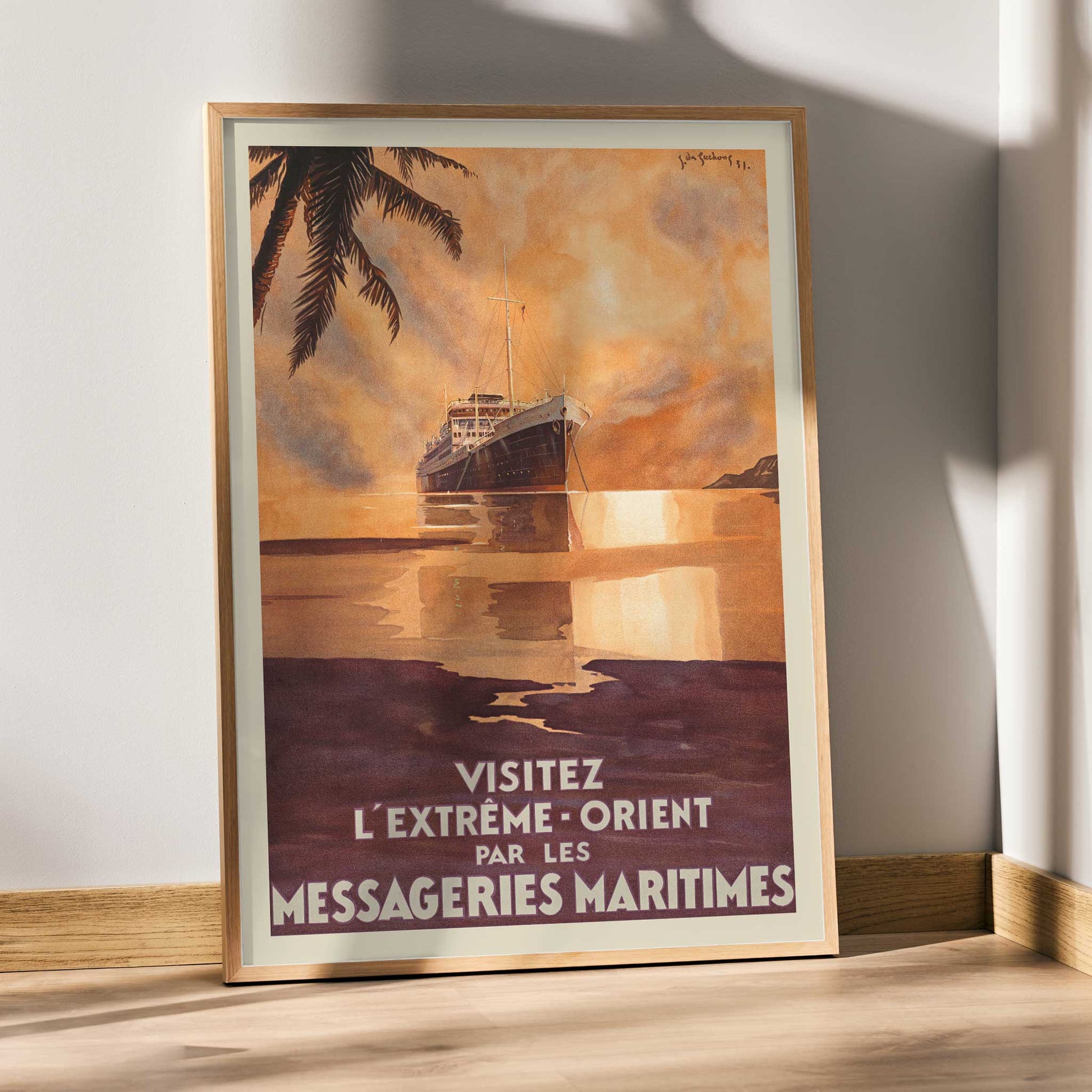 Visit the Far East by Messageries Maritimes poster with ship on calm water at sunset, palm silhouettes, maritime travel style, framed and displayed in modern living room decor