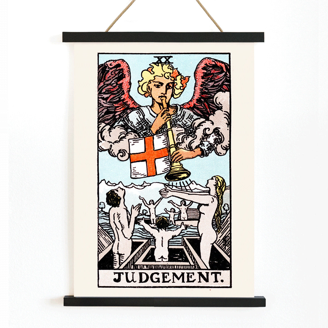 Judgement tarot card by Rider Waite showing an angel with a trumpet and people rising from graves poster, with wooden magnetic frame on white background