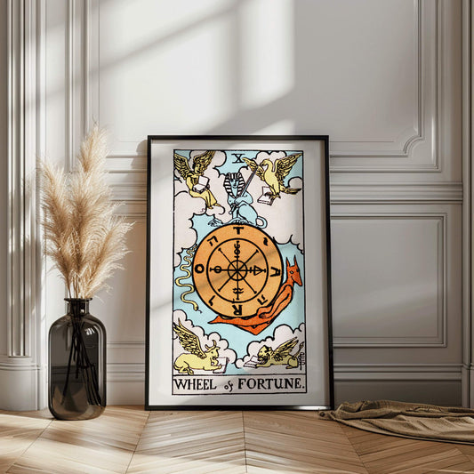 Tarot The Wheel Of Fortune by Rider Waite featuring a mystical wheel surrounded by mythical creatures poster and card artwork, framed and displayed in home decor