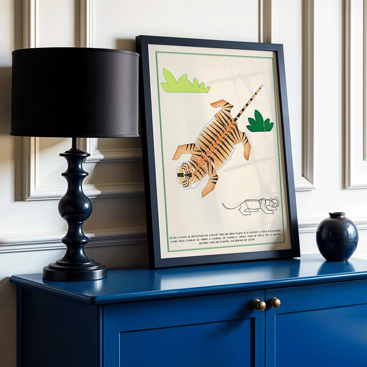 Geometric illustration poster of a tiger with plants in La Jungle chez moi Pl 08 by Turenne Chevallereau, framed and displayed in modern living room decor