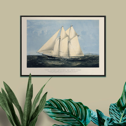 Chromolithograph artwork of Yacht Sappho sailing on the ocean by Currier and Ives poster showing sailing yacht at sea titled Chromolithograph of the yacht Sappho of New York, framed and displayed in home decor